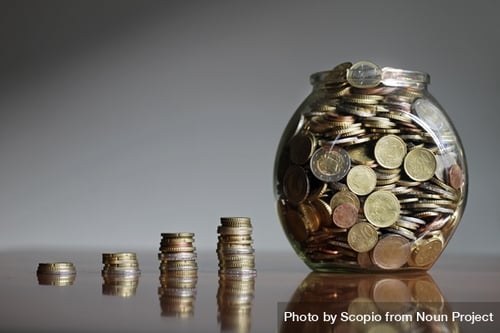 np_Growing stacks of Euro coins and a clear glass jar with money_5rKAp4_free